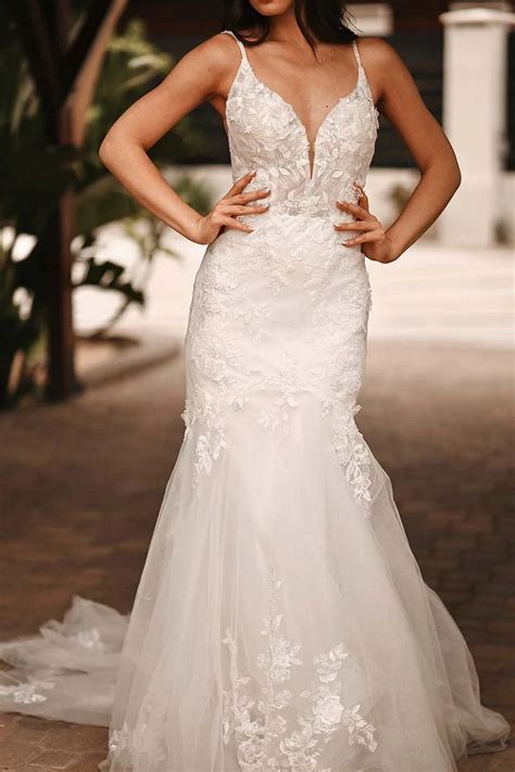 Stunning Lace Fit And Flare Wedding Dress With Plunging V Neckline