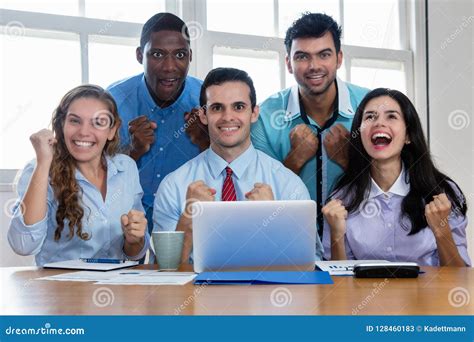 Group Of Cheering Latin And African American And Caucasian