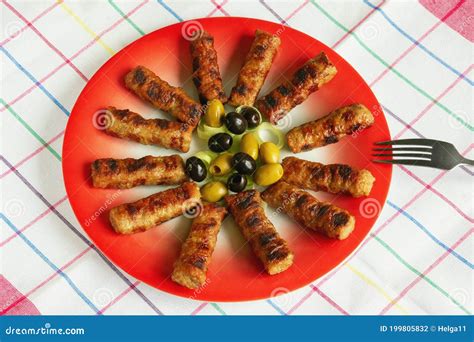 Balkan Cuisine Cevapi Grilled Dish Of Minced Meat Stock Photo