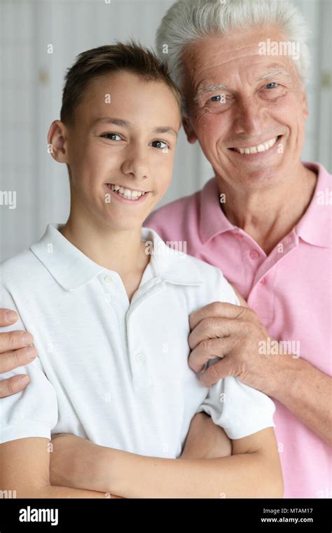 Smiling Grandfather And Grandson Stock Photo Alamy