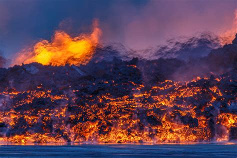 See Icelands Volcano Erupting Under The Northern Lights Time