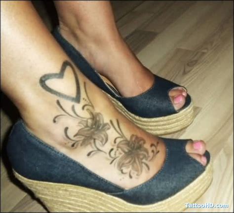 60 Lily Tattoos On Foot With Meaning