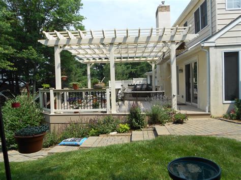A pergola is an outdoor construction that gives shade in your backyard. Deck with Pergolas | Deck Pergolas in Lancaster & Chester ...
