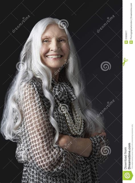 Photo About Portrait Of A Smiling Senior Woman With Long Gray Hair