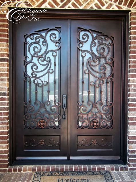 Custom Wrought Iron Front Door With Scrollwork And Medallions On Footboard Iron Front Door