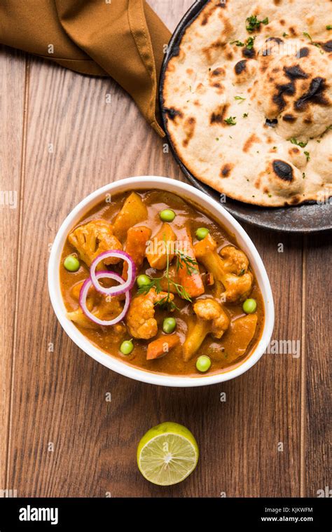 Aloo Gobi Matar Is A Famous Indian Curry Dish With Potatoes And