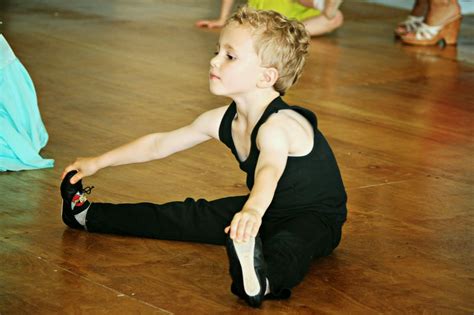 Ballet A Little Girl And Little Boys Learning To Dance Ballet