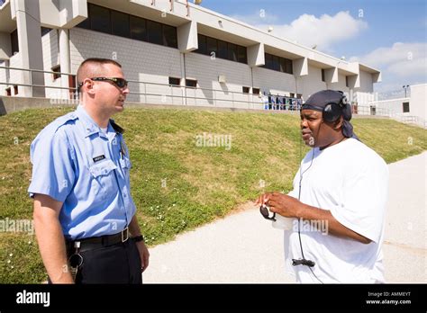 Correctional Officer And Inmate Talking Hi Res Stock Photography And