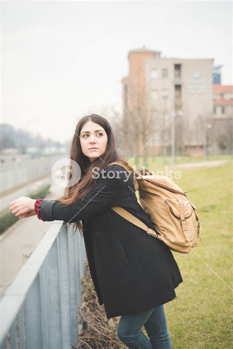 Knee Figure Of A Young Beautiful Brunette Long Hair Pensive And
