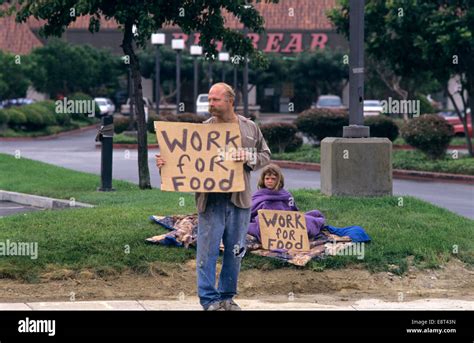 Homeless Man And Juvenile Girl Begging With Sign Will Work For Food