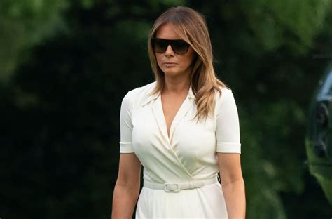 Melania Trump Returns To Dc In A Chic White Dress And Soaring Nude