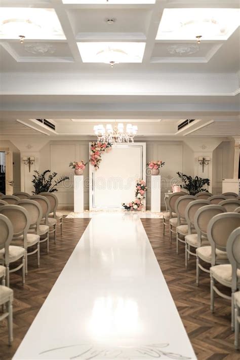 Wedding Hall Rows Of White Festive Chairs For Guests Stock Photo