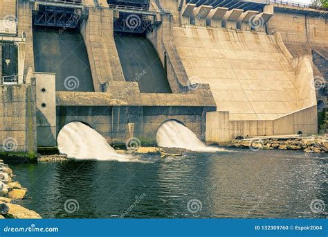 Dam And Turbines Of A Hydroelectric Power Station With Falling Water