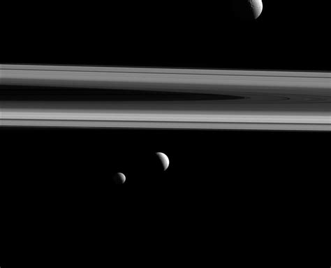 Three Of Saturns Moons Tethys Enceladus And Mimas Are Captured In This Group Photo From