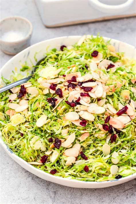 Brussel Sprout Slaw With Cranberries And Almonds The Little Green Spoon