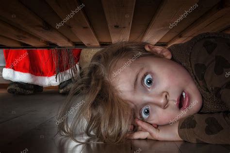 Little Girl Hiding Under The Bed — Stock Photo © Photoholic 84607730