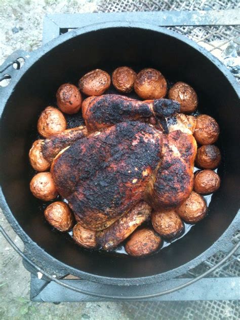 You don't have to heat up your whole oven to cook a batch of chicken. Roast Chicken cooked over coals in a 12" cast iron Dutch ...