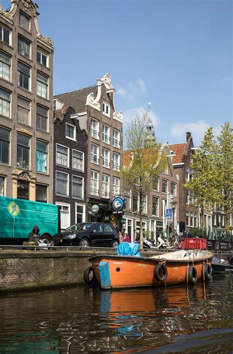 traditional historic dutch gable houses beside canal in amsterdam the netherlands editorial