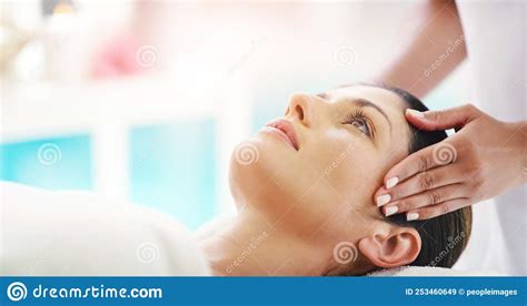 My Mind Is Ready For A Total Day Of Relaxation A Young Woman Getting A Head Massage At A Spa