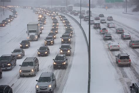 Winter Traffic Jam On Highway During A Midwest Snowstorm Stock Photo