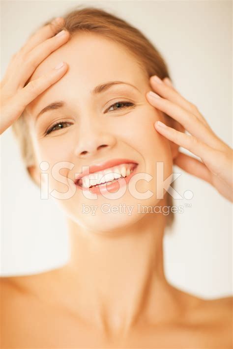 Woman Touching Her Face Stock Photo Royalty Free Freeimages