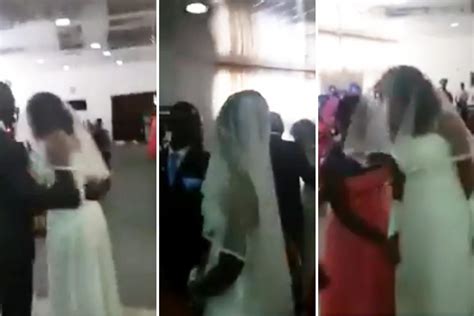 bizarre moment groom s mistress gatecrashes his wedding dressed as a bride and causes utter