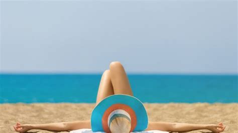 NC Beachfront Community Discussing Ban On Topless Sunbathing