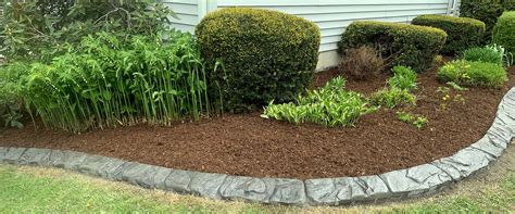 Lawn and garden edging elevates your landscape much like how a frame does a photo: Decorative Concrete Edging