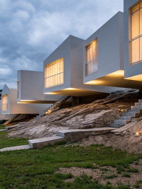 Five Houses Cantilever Out From A Rocky Hillside In Argentina