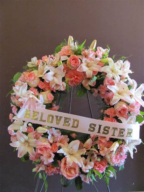 Stunning Wreath Filled With Lillie Roses And Carnations Apple
