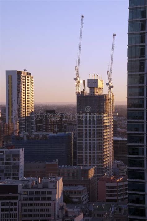 New High Rise Towers Under Construction With Urban Sprawl In Background