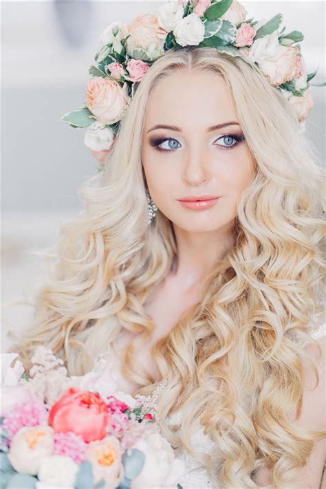 gallery bloned long wavy wedding hairstyle with pastel flower crown deer pearl flowers 2023