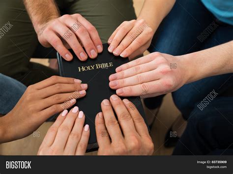 People Holding Holy Bible Image And Photo Bigstock