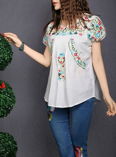 With short puff sleeves and a slight crop, this top plays nicely with jeans and. Short Sleeved Peasant Blouse - Black
