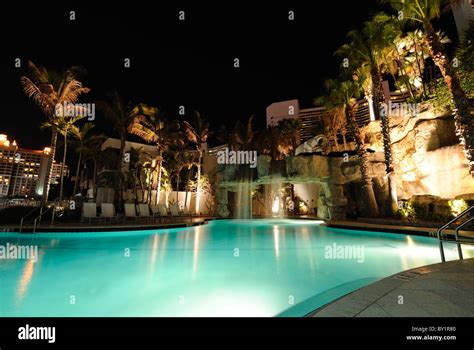 A Resort Swimming Pool At Night Stock Photo Alamy