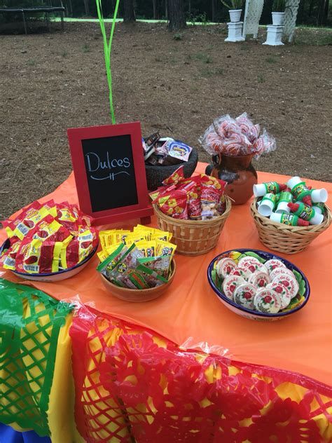A Table Topped With Lots Of Candy And Candies