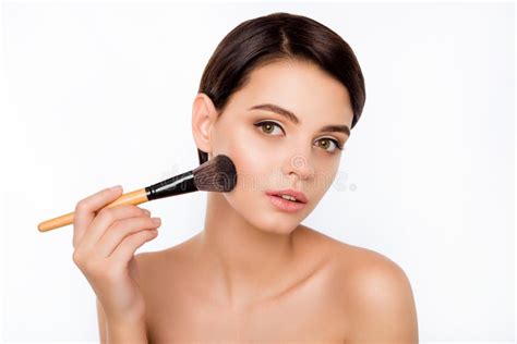 Portrait Of Young Beautiful Woman Holding The Makeup Brush Stock Image