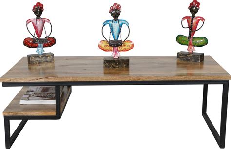 Industrial coffee tables also tend to offer options like caster wheels, additional metal shelving, and inside storage. Contemporary industrial style light mango wood coffee table