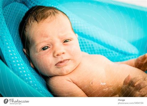Cute Little Baby Boy Portrait In Milk Bath With Sunflowers Healthy