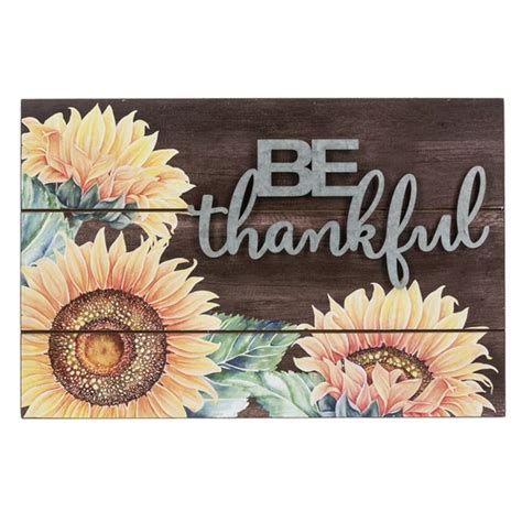 A Wooden Sign With Sunflowers Painted On It