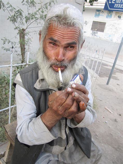 Old Man Smoking Photograph By Nasir Bilal