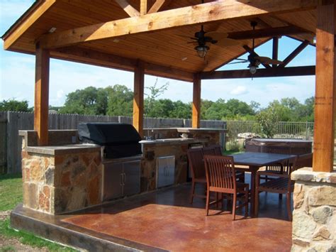 Covered outdoor stone kitchen with patio dining area. Image result for patio gable roof plans | Covered outdoor kitchens, Covered patio plans, Patio