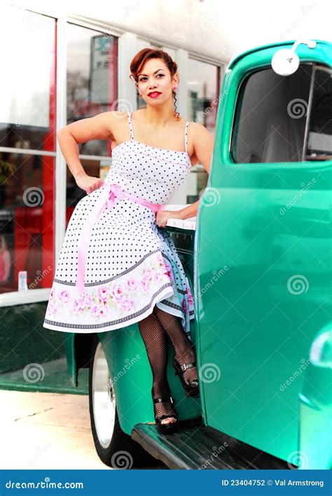 Happy Pinup Girl Sitting On Old Truck Stock Photography Image 23404752