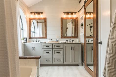 Modern farmhouse master bathroom renovation with delta (via: Family Tackles a Modern Farmhouse-Style Master Bath Remodel