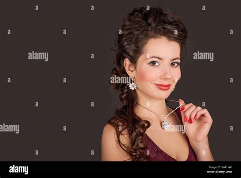 Glamorous Woman In Jewelry Pendants And Earrings Stock Photo Alamy