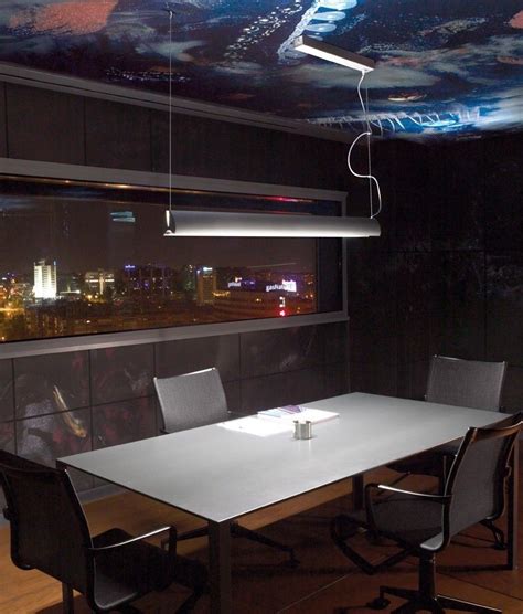 Ceiling lights suspended above dining table in modern open. Thin Aluminium Suspended Ceiling Light | Ceiling lights ...