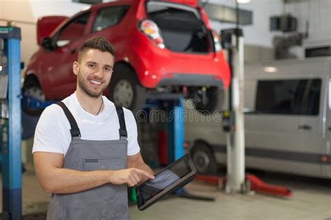 Mechanic At The Car Service Stock Image Image Of Digital Standing