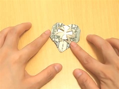 How To Fold A Dollar Into A Heart Money Origami Heart Fold Dollar