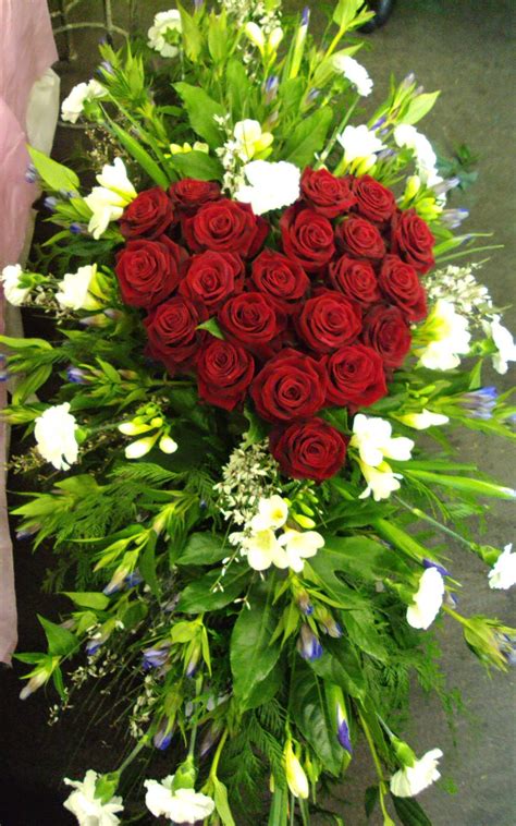 Beautiful Red Roses In A Heart Shape Funeral Flower Arrangements