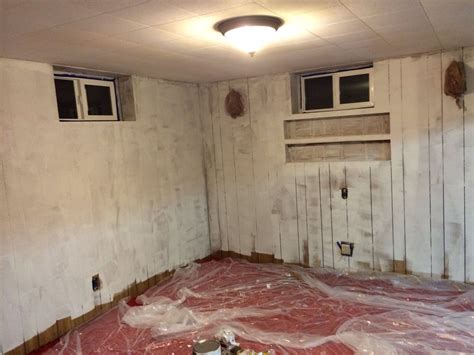 Our 70s Basement After The Wood Paneling Has Primer On It This Is One